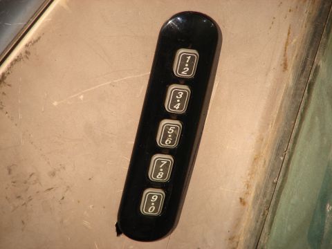 1973 Ford Ranchero - Keypad with numeric buttons is shown close up on a textured surface.