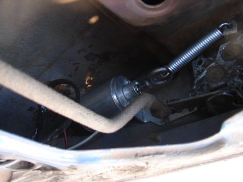 1973 Ford Ranchero - The internal workings of a vehicle's door latch assembly are visible in this close-up shot.