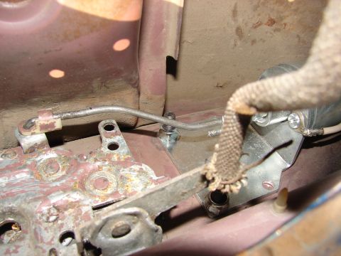 1973 Ford Ranchero - Detail of a vehicle's door latch assembly, showing mechanical components and wiring.