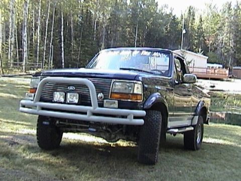 1995 Ford Bronco - This 1995 Ford Bronco is equipped with a prominent bull bar on the front.