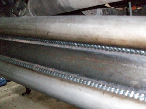 1996 Ford Bronco - Welded exhaust pipes are visible in this close-up shot.