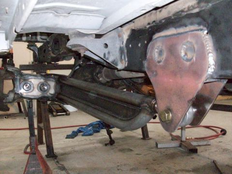 1996 Ford Bronco - Underbody view of vehicle suspension and frame components, showing custom fabrication work.
