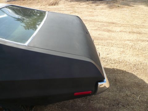1975 Ford Ranchero - Rear view of a 1975 Ford Ranchero, showing the trunk lid and quarter panel.