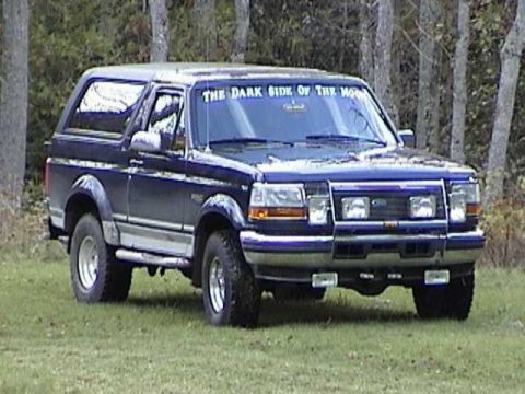1995 Ford Bronco - 1995 Ford Bronco with 'The Dark Side of the Moon' text on its windshield.