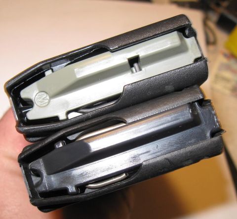 2000 Ford Crown Victoria - Close-up view of two rifle magazines, showing their internal components and construction.