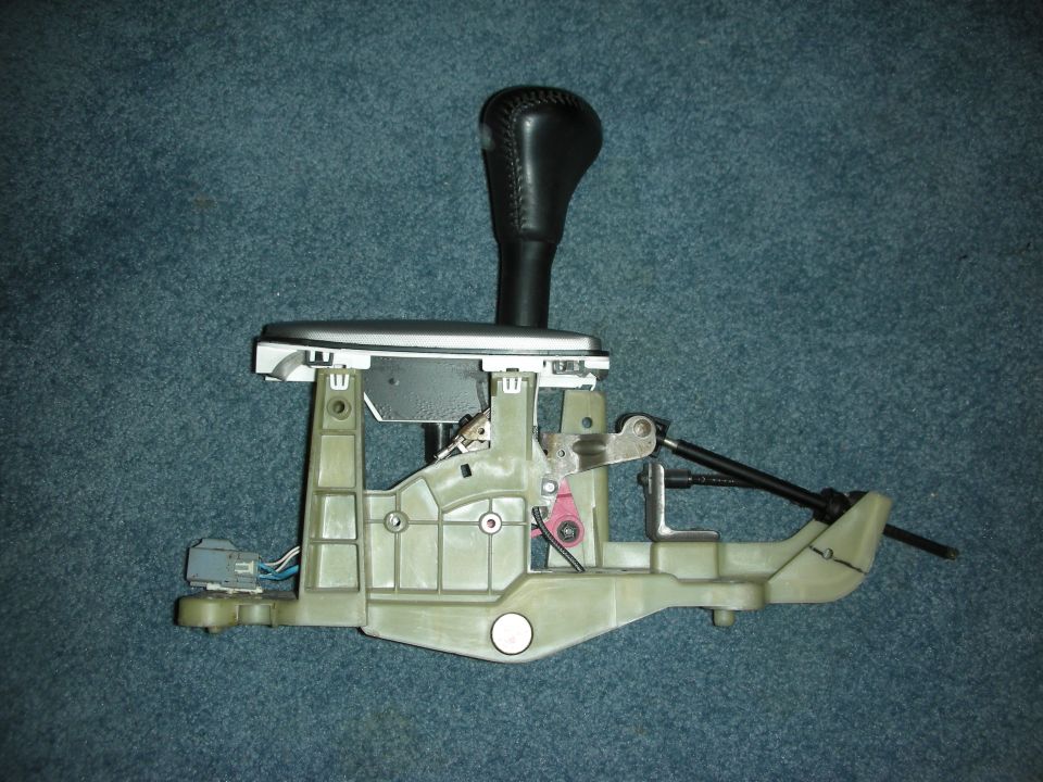 Gear shifter assembly with black leather knob