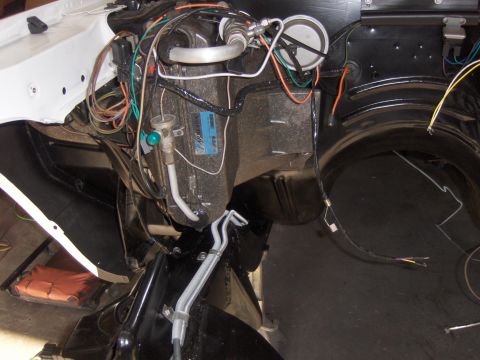 1970 Chevrolet Camaro - Close-up of an automotive HVAC unit and associated wiring, with a blue label visible on the unit.