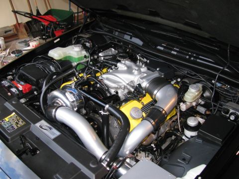 2003 Mercury Marauder - Customized engine bay a turbocharger and aftermarket intake system.