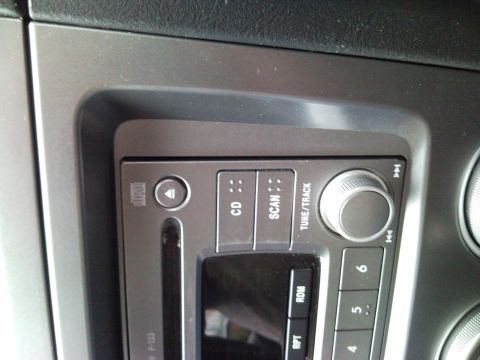 2007 Subaru Impreza - The car stereo features a CD slot and various control buttons for audio playback and tuning.