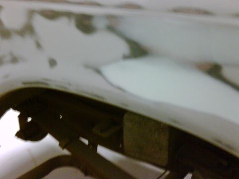 1979 Ford F-250 - Bodywork is being prepared for paint on the rear fender of a vehicle.