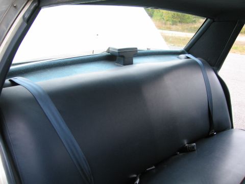 1991 Ford LTD Crown Victoria - Interior view of a car's rear seat and seatbelts.