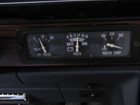 1991 Ford LTD Crown Victoria - Interior view of dashboard gauges including oil pressure, battery voltage, and water temperature readings.