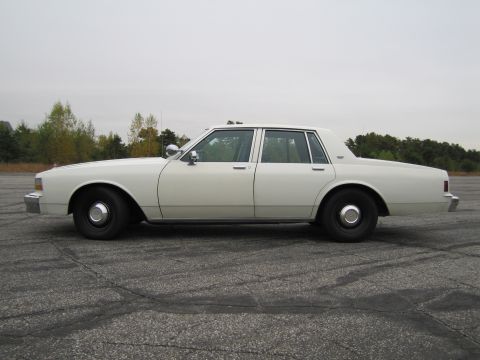 1991 Ford LTD Crown Victoria - This sedan's body style suggests it is from the 1980s, not 1991.