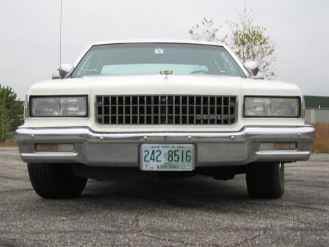 1991 Ford LTD Crown Victoria - This Chevrolet Caprice sedan is shown from the front, its distinctive chrome grille and front bumper.
