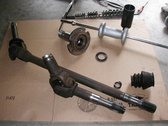 Thd passenger side TTB axle stuff, inner slipshaft, and outer shafts, spindle, boot, and some tools, the hub spindle nut tool and a spindle puller.