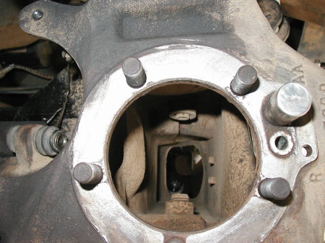 looking down through the knuckle (spindle removed and axleshaft out).  Note the ABS senso on the right of the knuckle bolt pattern.