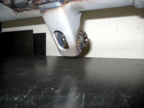 1996 Ford Bronco - A metal bracket, likely custom-fabricated, is shown with detailed welds and mounting points.