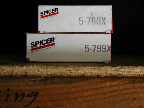 1995 Ford Bronco - Boxes of Spicer drivetrain components are stacked, showing part numbers 5-760X and 5-799X.