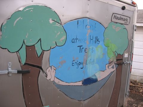 1900 Ford C-350 (Centurion Conversions) - Trailer side mural depicts trees and a person relaxing in a hammock with inspirational text.