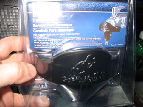 1900 Ford C-350 (Centurion Conversions) - Trailer coupler lock with "Gotcha" embossed on the black cover. Packaging indicates it fits 2 5/16" couplers.
