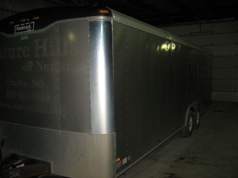 1900 Ford C-350 (Centurion Conversions) - Silver enclosed cargo trailer with "Nature Hills Nursery" text, phone number, and website visible on the side.