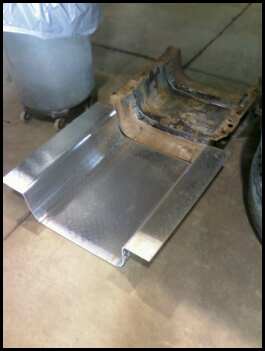 1996 Ford Bronco - A new gas tank skid plate is shown, possibly for a 1996 Ford Bronco as indicated by the registry.