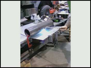 1996 Ford Bronco - Metal fabrication work in progress, possibly for a vehicle part.