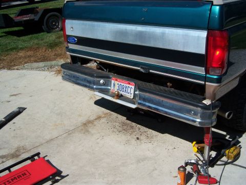 1996 Ford Bronco - Rear view of a 1996 Ford Bronco, showing the bumper, license plate, and tailgate area.