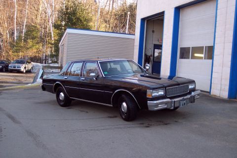 2001 Ford Crown Victoria - This Chevrolet Caprice sedan appears to be from the early to mid-1980s, not a 2001 Ford Crown Victoria.
