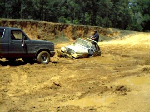1991 Ford Bronco - Pulling out a jeep.