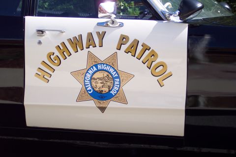 2001 Ford Crown Victoria - Door of a California Highway Patrol vehicle, showing the official seal and lettering.