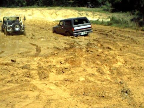 1991 Ford Bronco - Me stuck in the middle hole.