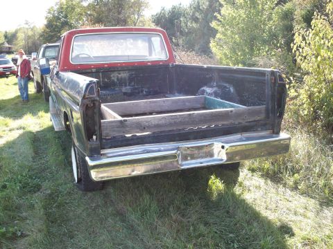 1988 Ford F-150 - This 1988 Ford F-150 pickup truck is seen from the rear, a custom wooden bed insert.