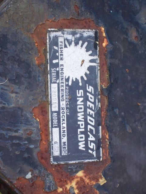 1988 Ford F-150 - A close-up of a weathered data plate for a Speedcast Snowplow, indicating it is a product of Fisher Engineering.