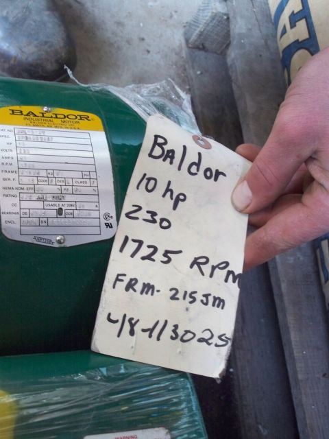 1988 Ford F-150 - A Baldor 10 hp industrial motor is shown with a handwritten tag detailing its specifications.