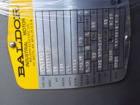 1988 Ford F-150 - A data plate for a Baldor Industrial Motor lists its electrical and mechanical specifications.