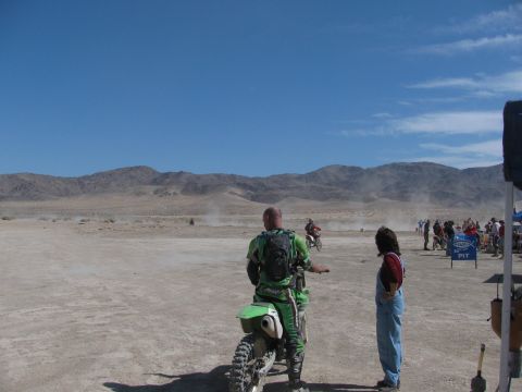 1996 Ford C-350 (Centurion Conversions) - Desert scene with dirt bike riders and spectators at a race event.