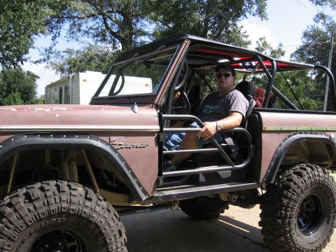1967 Ford Mustang - This modified 1975 Ford Bronco features a full roll cage and aggressive off-road tires, ready for adventure.