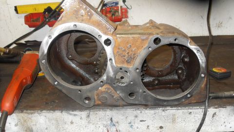 1997 Ford Ranger - Close-up of a heavily rusted metal casting with visible gears inside, likely a vehicle part.
