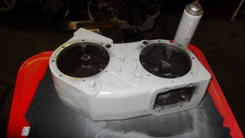 1997 Ford Ranger - A painted automotive transmission housing sits on a red tray, ready for installation or repair.