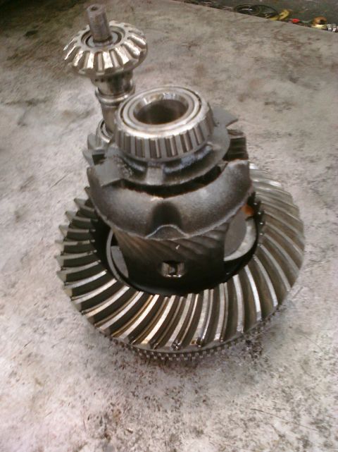 1993 Ford Bronco - Close-up of differential gears and bearings, likely removed from a vehicle.