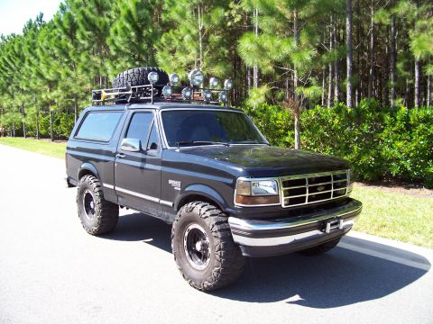 1994 Ford Bronco - This modified Ford Bronco is equipped for off-road adventures with its lifted suspension and auxiliary lighting.