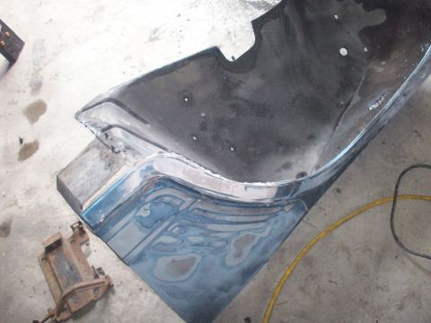 1978 Jeep CJ5 - Fender section undergoing repair with body filler and primer visible.