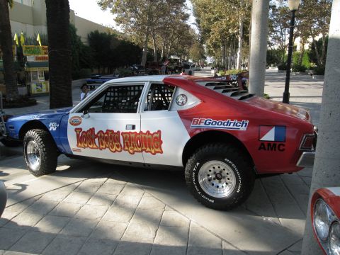 1986 Ford Bronco - This modified AMC Pacer features off-road tires and racing livery, indicating it's not a 1986 Ford Bronco.