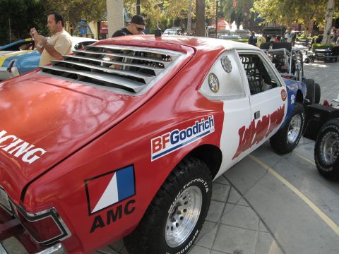 1986 Ford Bronco - AMC race car with BFGoodrich branding and off-road tires is parked outdoors.