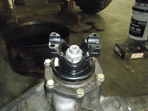 1978 Ford Bronco - Close-up of a universal joint and differential housing, likely during maintenance or repair.