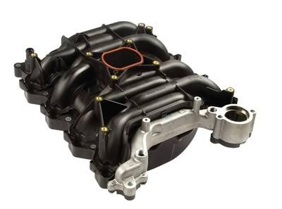 1998 Ford Crown Victoria - This is a plastic intake manifold with a metal bracket attached, shown against a white background.
