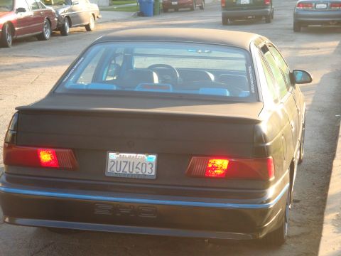 1993 Ford Taurus - Rear view of a 1993 Ford Taurus SHO, showing its distinctive taillights and SHO badging.