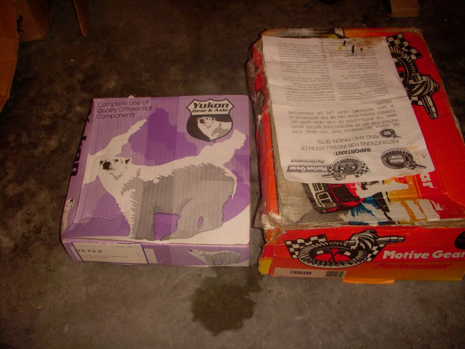 Yukon Gear & Axle and Motive Gear differential gear boxes on concrete floor