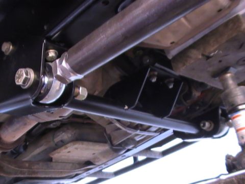 1997 Ford Ranger - Close-up view of aftermarket suspension components, likely for off-road modification.
